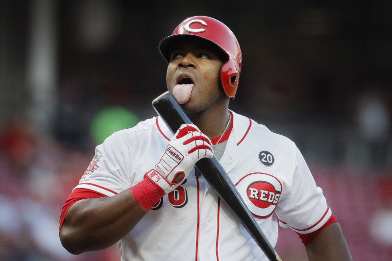 Cincinnati Reds right fielder Yasiel Puig leaves the field at the end of  the top of the ninth i …