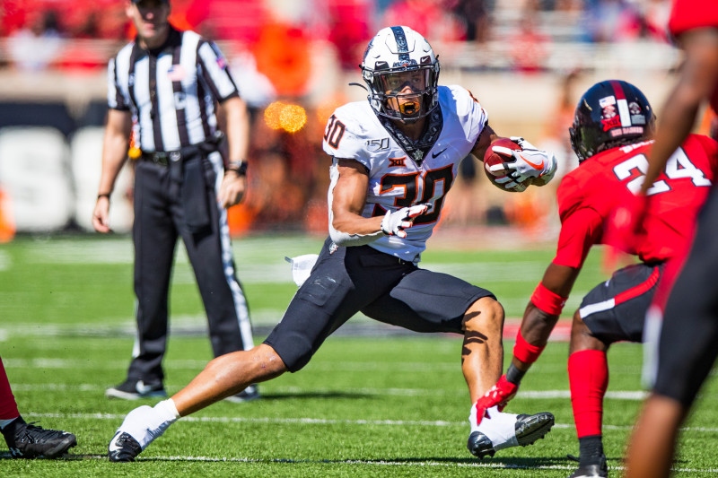 Oklahoma State running back Chuba Hubbard (30) runs for 84 yards during the  third quarter of an NCAA college football game in Stillwater, Okla.,  Saturday, Sept. 28, 2019. Hubbard led Oklahoma State