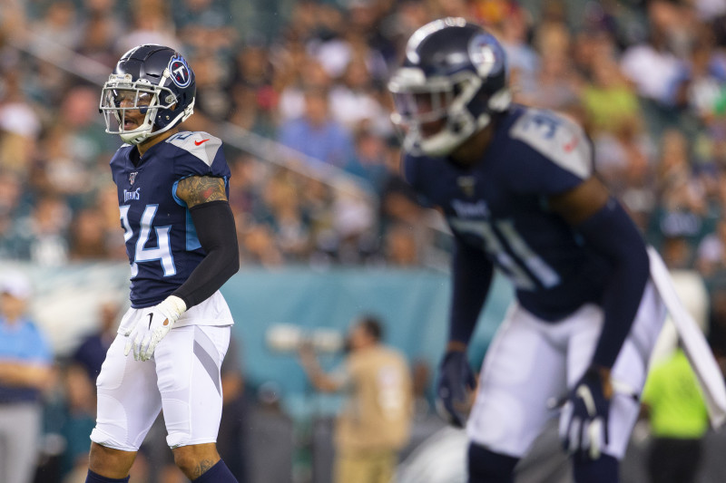 Kenny Vaccaro of the Tennessee Titans flexes his muscles during