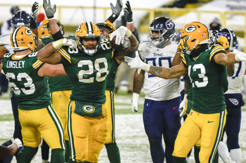 Aaron Rodgers throws 4 TD passes in the snow as the Green Bay Packers rout  the Tennessee Titans: Recap, score, stats and more 