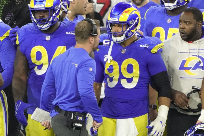 Los Angeles Rams defensive lineman Aaron Donald explodes through a double  team on way to sack of Cincinnati Bengals quarterback Joe Burrow