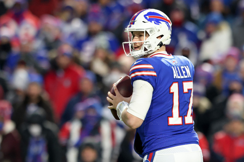 Josh Allen wears red Buffalo Bills helmet at Highmark Stadium