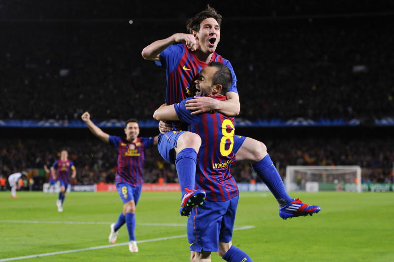 BARCELONA, SPAIN - APRIL 24: Lionel Messi of FC Barcelona celebrates with his team-mate Andres Iniesta (R) after Iniesta scored their team's second goal during the UEFA Champions League Semi Final, second leg match between FC Barcelona and Chelsea FC at Camp Nou on April 24, 2012 in Barcelona, Spain. (Photo by David Ramos/Getty Images)