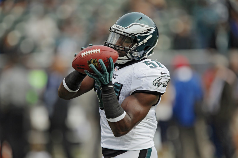 OAKLAND, CA - NOVEMBER 03:  Linebacker Emmanuel Acho #51 of the Philadelphia Eagles catches a pass while warming up before a game against the Oakland Raiders on November 3, 2013 at O.co Coliseum in Oakland, California.  The Eagles won 49-20. (Photo by Brian Bahr/Getty Images)