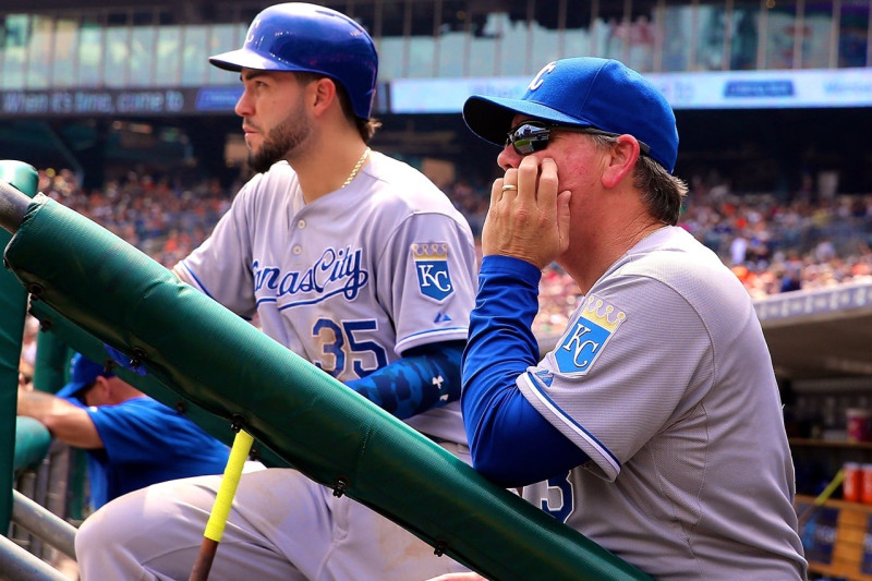 Kansas City Royals second baseman Omar Infante (14) jumps into the