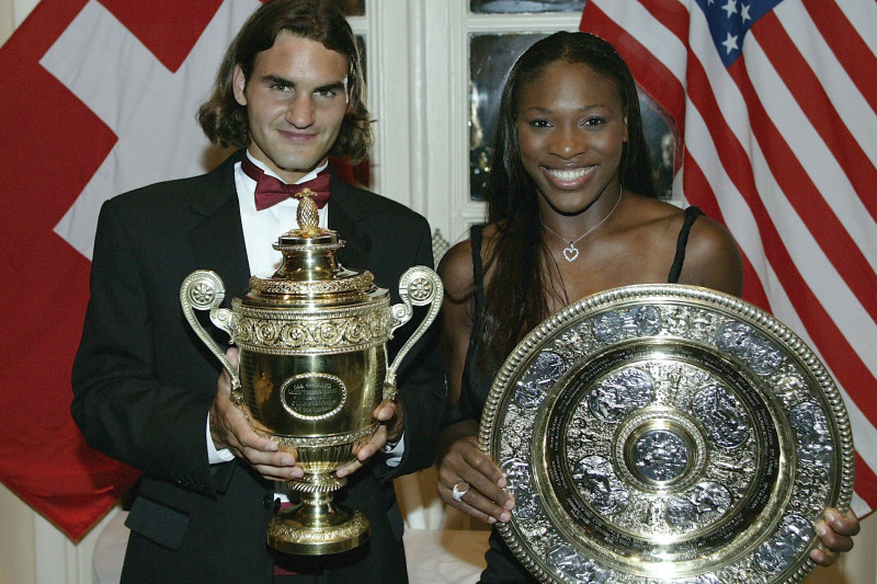 LONDON - JULY 6:  Wimbledon Champions Roger Federer of Switzerland and Serena Williams of the U.S. pose for photographs prior to attending the Wimbledon Ball at the Savoy Hotel on July 6, 2003 in London.  (Photo by Alex Livesey/Getty Images)