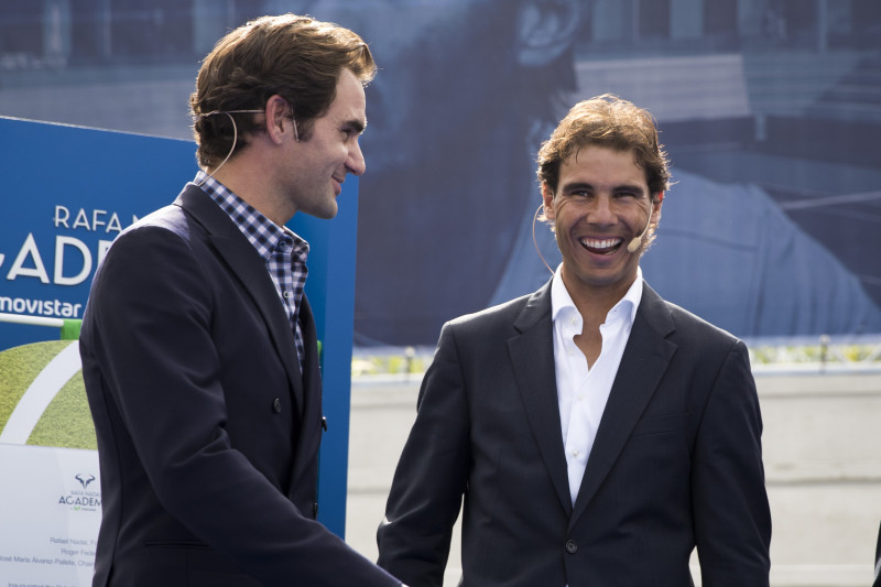 Spanish tennis player Rafael Nadal (R) laughs beside Swiss's player tennis Roger Federer during the opening of the Rafa Nadal Academy in Manacor on October 19, 2016. / AFP / JAIME REINA (Photo credit should read JAIME REINA/AFP/Getty Images)