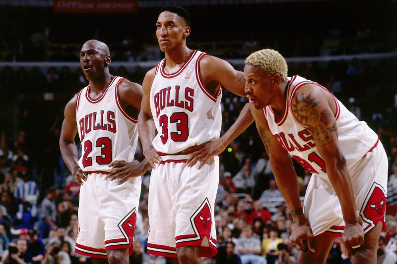 CHICAGO - MAY 20:  (L to R) Michael Jordan #23, Scottie Pippen #33 and Dennis Rodman #91of the Chicago Bulls look on during a break in game action during the NBA Eastern Conference Finals against the Miami Heat at the United Center on May 20, 1997 in Chicago, Illinois. The Bulls won 84-77.  NOTE TO USER: User expressly acknowledges  and agrees that, by downloading and or using this  photograph, User is consenting to the terms and conditions of the Getty Images License Agreement. (Photo by Andrew D. Bernstein/ NBAE via Getty Images)