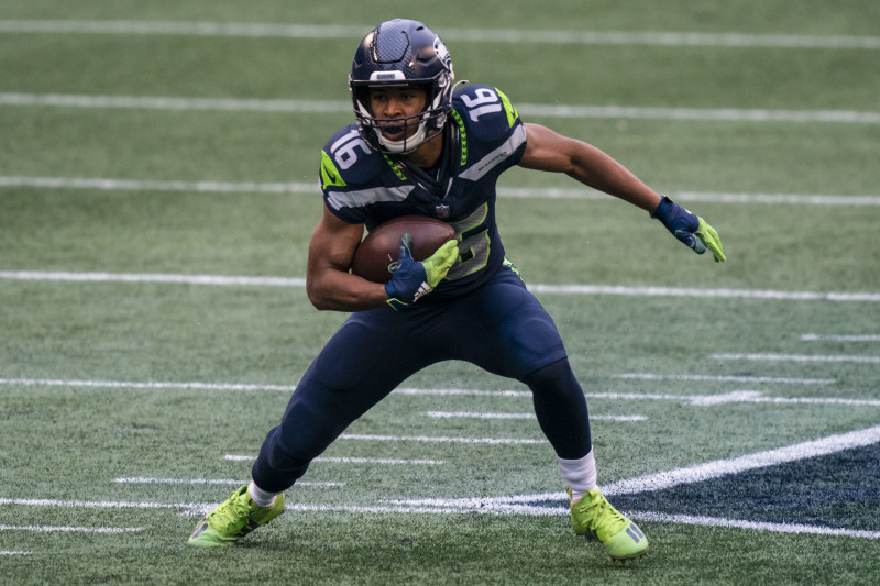 Tyler Lockett of the Seattle Seahawks runs the ball after a catch in