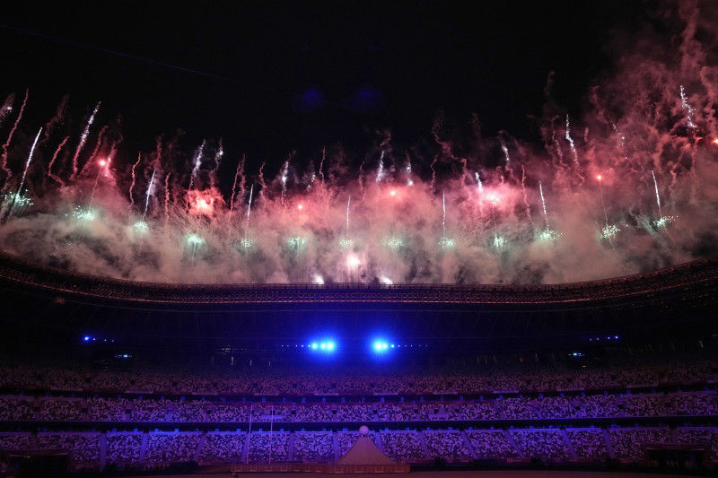 Fireworks explode during the opening ceremony in the Olympic Stadium at the 2020 Summer Olympics, Friday, July 23, 2021, in Tokyo, Japan. (AP Photo/David J. Phillip)