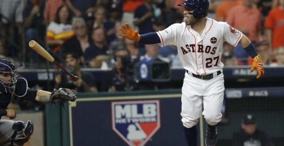 Let's all watch Evan Gattis homer on a pitch he had no business hitting in  the first place